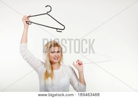Woman Holding Clothes Hanger