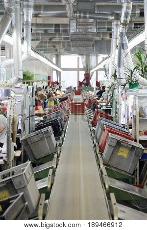 MOSCOW, RUSSIA - FEBRUARY 21, 2017: Moscow shoe factory JSC RALF RINGER . The main conveyor of the sewing workshop.