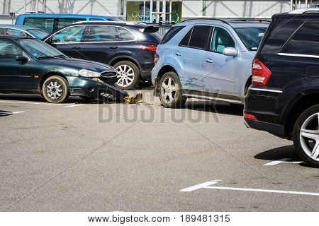 Car accident in the parking lot. Inattention behind the wheel concept