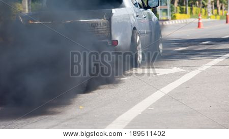 Race car burns rubber off its tires in preparation for the race
