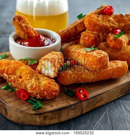 Crispy Halloumi cheese sticks Fries with Chili sauce for dipping