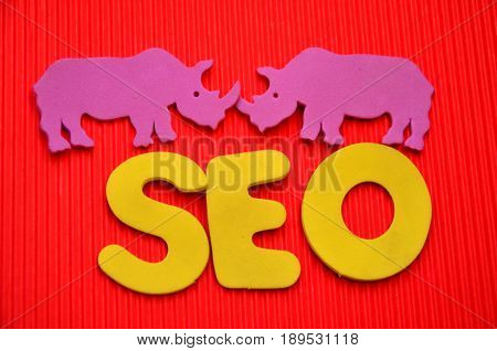word seo on a  abstract red background