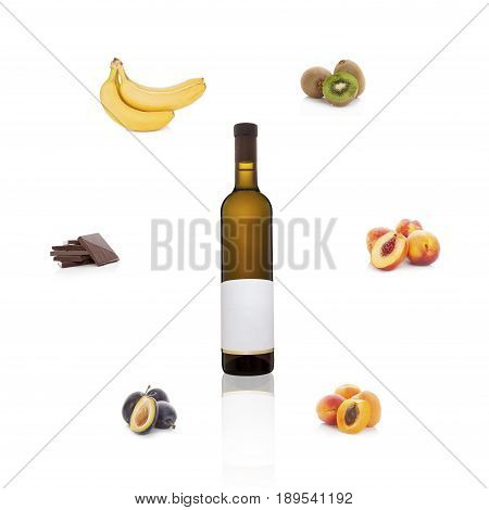 White wine with empty label with different fruits and chocolate isolated on white background. Aroma of wine. Wine bouguet.