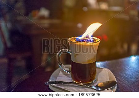 A cup of burning coffee in old bar of Lvov Ukraine.