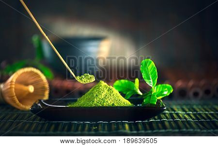 Matcha. Organic Green Matcha Tea ceremony. Matcha powder. Cooking with matcha, recipe. Vegetarian food, Japanese food. Dark still life