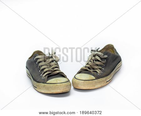 close up Dirty shoe on isolate white background close up shoedirty blue shoes on the white background canvas blue shoes old shoesneaker shoe
