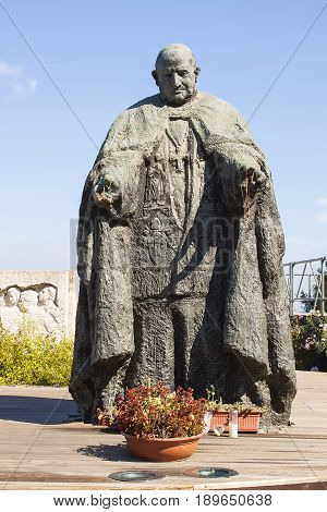 LORETO, ITALY - AUGUST 8, 2010: Monument of Papa Giovanni XXIII in the square of Loreto, Marche, Italy