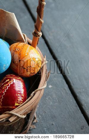 Easter eggs and natural wooden country table