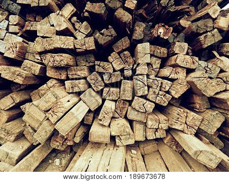 Terrible Smell Pile Of Extracted Old Wooden Ties. Old Oiled Used Oak Railway Sleepers Stored
