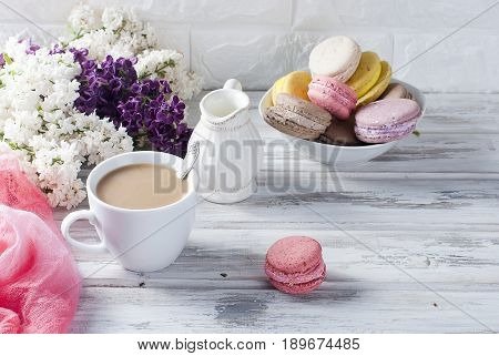 Coffee And Macaruns On A White Background