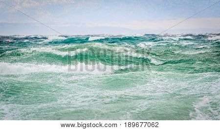 Strong Wind, Sea Waves And The Coast Or Beach.