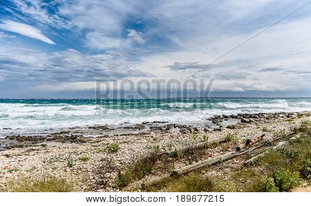 Strong Wind, Sea Waves And The Coast Or Beach.