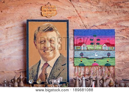 PETRA, JORDAN. May 1, 2014. Carpet with a portrait of Jordanian king Abdullah II in a souvenir shop in the Petra historical and archaeological park.