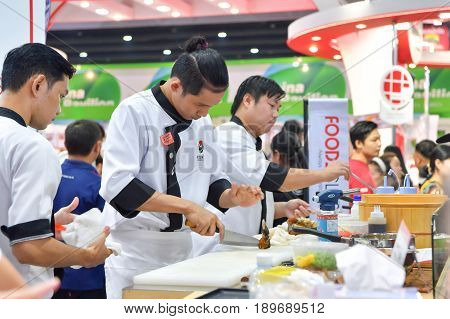 NONTHABURI - JUNE 04 : Chefs are cooking demonstrations to visitors and buyer in during exhibition of THAIFEX - World of food ASIA 2017 on June 04 2017 in Nonthaburi Thailand.