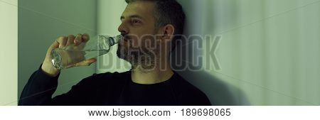 Drinker With Bottle Of Vodka