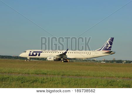 Amsterdam the Netherlands - June 1st 2017: SP-LND LOT - Polish Airlines Embraer ERJ-195LR taking off from Polderbaan Runway Amsterdam Airport Schiphol