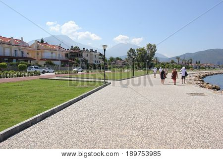 31ST MAY 2017,FETHIYE, TURKEY: Tourists walking along the promanade in the port of Fethiye in Turkey, 31st may, 2017