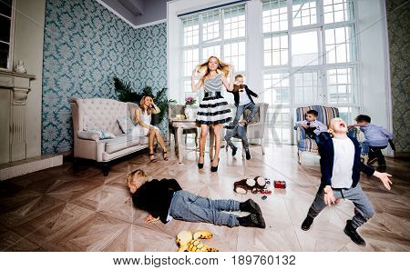 Moms and kids spending time in the living room