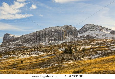 Winter landscape in Alps in Devoluy Massif (Mountain Aurouze and Peak Bure) without snow in late December - a very worrying sign of climate change.