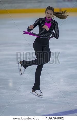 Minsk Belarus -April 23 2017: Unidentified Female Figure Skater performs Chicks Ladies Free Skating Program at Minsk Arena Cup 2017 International Figure Skating Competition in April 23 2017 in Minsk Belarus