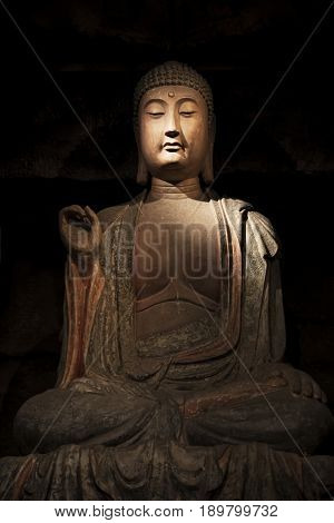 Stone Buddha and relics from the Zhongshan Grottoes in Zichang County displayed at the Shaanxi History Museum in Xian Shaanxi Province in China