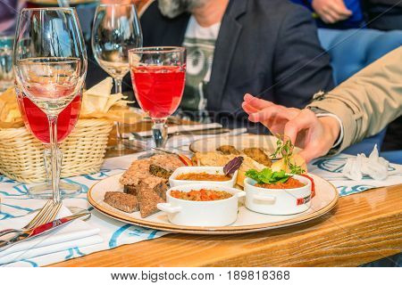 Variety of pate and suace on a plate