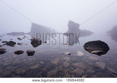 Magnificent seascape over the rock phenomenon The Ships, Sinemorets village, Bulgaria. Foggy weather.