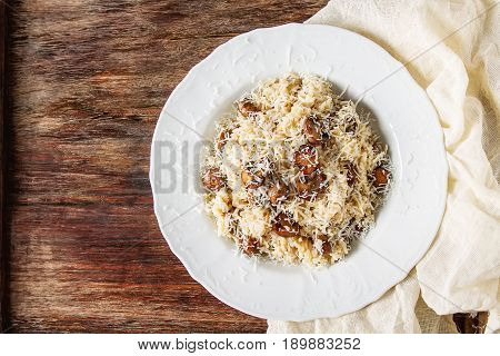 Mushroom Risotto With Parmesan Cheese. Italian Food. Simple Back