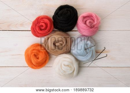 Top view of wool needle felting kit isolated on white