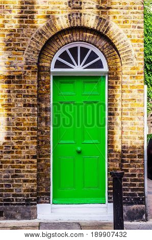 Stylish Entrance To A Residential Building, An Interesting Facade Of The Old Brick Arches Above The