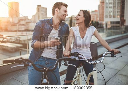 Romantic Couple With Bicycles In The City