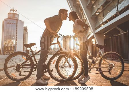 Romantic Couple With Bicycles In The City