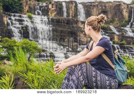 Young Woman Hiker, Tourist On The Background Of Amazing Pongour Waterfall Is Famous And Most Beautif