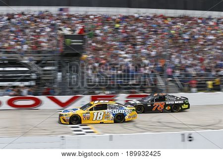 June 04, 2017 - Dover, DE, USA: Kyle Busch (18) battles for position during the AAA 400 Drive for Autism at Dover International Speedway in Dover, DE.
