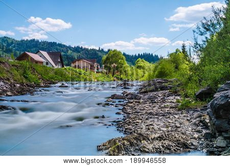 Background Of Carpathian Mountain River With Long Exposure