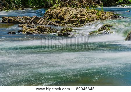 Background Of Carpathian Mountain River With Long Exposure