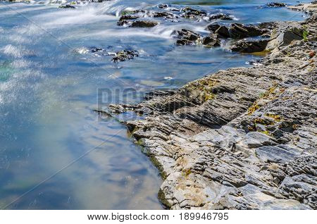 Background Of Carpathian Mountain River With Long Exposure