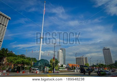 Kuala Lumpur, Malaysia - March 9, 2017: Malaysia flag waving tall in Merdaka Square, in the city downtown