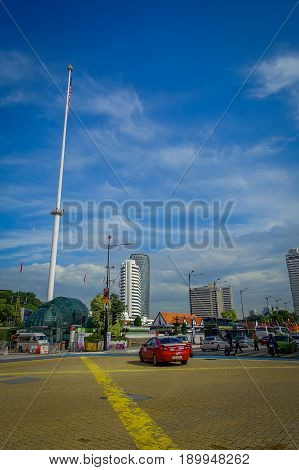 Kuala Lumpur, Malaysia - March 9, 2017: Malaysia flag waving tall in Merdaka Square, in the city downtown