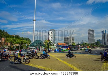 Kuala Lumpur, Malaysia - March 9, 2017: Malaysia flag waving tall in Merdaka Square, in the city downtown