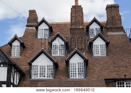 Ruthin Wales UK - June 4 2017: The Seven Eyes of Ruthin on the Myddleton Arms on Saint Peters Square a rare and unusual multi dormer set of windows built circa 16th century