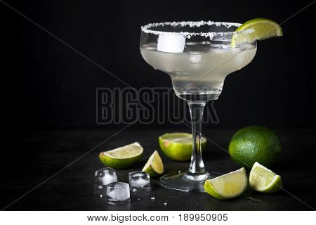 Margarita cocktail on black background. With space for your text