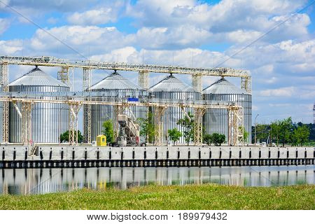 Grain Elevator In Agricultural Zone. Granary With Mechanical Equipment For Receiving, Cleaning, Dryi