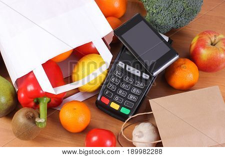 Payment Terminal And Mobile Phone With Nfc Technology, Fruits And Vegetables, Cashless Paying For Sh