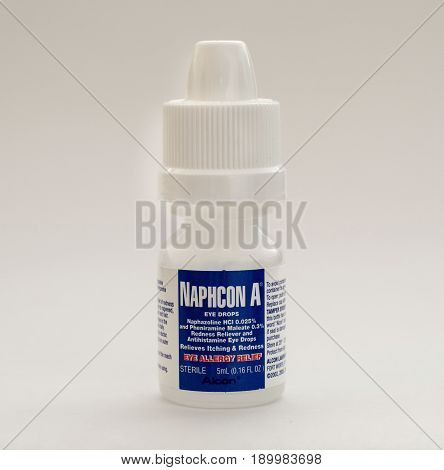 New York May 26 2017: Bottle of Naphcon A eye drops stands against white background. The medicine helps alleviate allergy symptoms.