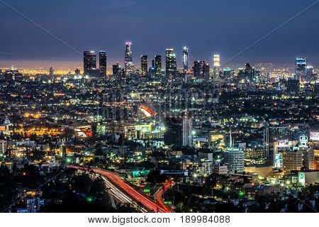Long exposure night view of Los Angeles downtown and surrounding metropolitan area from the Hollywood hills