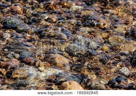small stones in river transperent clean whater