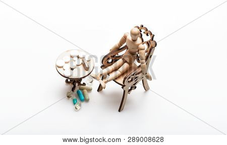 Take Medicines After Food. Medication Regimen. Health Care And Medical Treatment. Pills On Tiny Wood