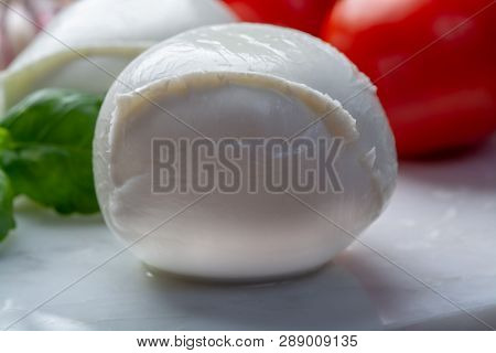 Balls Of Buffalo Mozzarella, Soft Italian Scheese Made From The Milk Of Italian Mediterranean Buffal