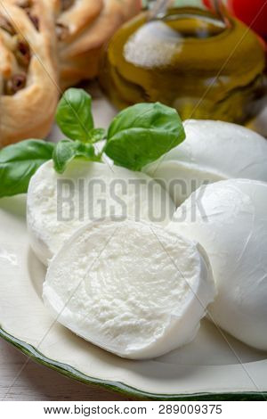 Balls And Pieces Of Buffalo Mozzarella, Soft Italian Scheese Made From The Milk Of Italian Mediterra